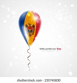 Celebration and gifts. Ribbon in the colors are twisted under the balloon. Independence Day. Balloons on the feast the national flag of Moldova