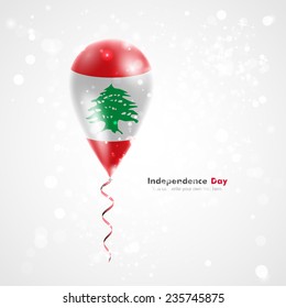 Celebration and gifts. Ribbon in the colors are twisted under the balloon. Independence Day. Balloons on the feast of the national Flag of Lebanon