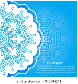 Celebratory bright background for Christmas and New Year. Greeting card. Space for text.  Blue gradient background. Blue decorative snowflakes on a white background. A stylized drawing. Mandala.