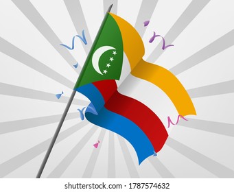 The celebratory flag of Comoros is flying at height