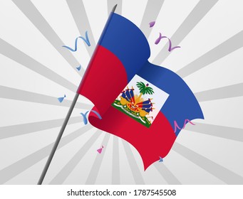 The celebratory flag of Haiti flies at height