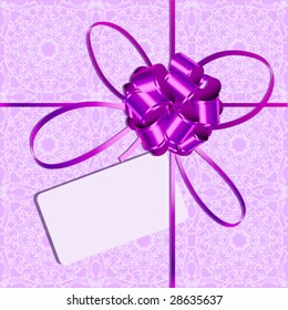 Celebratory packing with violet bow and card