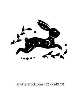 Celestial animal silhouette of running rabbit. Magic bunny with natural elements. Black magical bunny rabbit, mystic crescent moon esoteric symbol, constellation elements. Vector rabbit for decoration