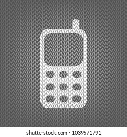 Cell Phone sign. Vector. White knitted icon on gray knitted background. Isolated.