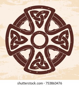 Celtic cross. National ornament on a beige background with the aging effect.