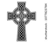 Celtic Cross with white patterns on a black background
