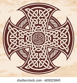 Celtic national ornament in the shape of a cross. Brown drawing with aging effect on a beige background.