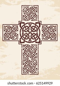 Celtic national ornament in the shape of a cross. Brown pattern on a beige background.
