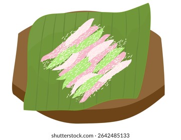 Cenil cake with sprinkle of coconut grated on banana leaves, a traditional colorful snack from Indonesia.