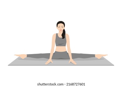 Center Splits Pose. Beautiful girl practice Pike Samakonasana. Young attractive woman practicing yoga exercise. working out, black wearing sportswear, grey pants and top, indoor full length, calmness