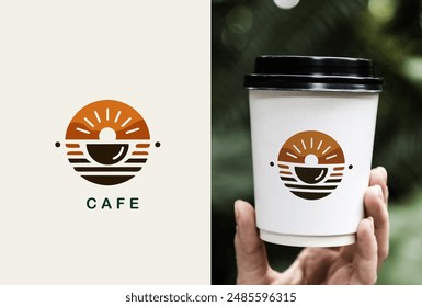  The central graphic is a stylized depiction of a coffee cup, with the cup’s handle resembling a smile. Above the cup, there is an image that suggests a rising or setting sun