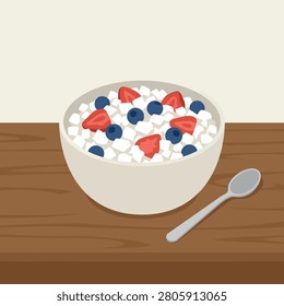 A ceramic bowl containing cottage cheese topped with fresh strawberries and blueberries on a table.