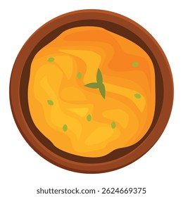 Ceramic bowl is filled with appetizing pumpkin cream soup decorated with fresh greens