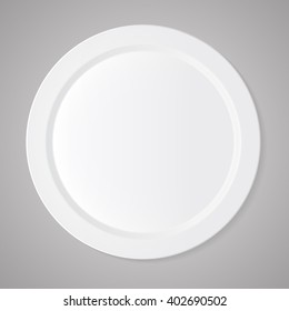Ceramic circle white plate with gray tablecloth