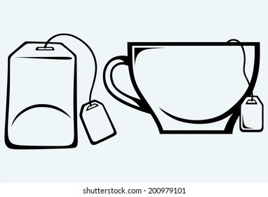 Ceramic mug with teabag label. Image isolated on blue background