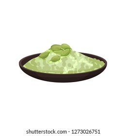 Ceramic plate with cardamom powder and green seeds on top. Aromatic seasoning. Cooking ingredient. Flat vector icon