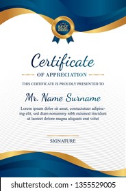 Certificate of appreciation template, gold and blue color. Clean modern certificate with gold badge. Vertical certificate border template with luxury and modern line pattern. Diploma vector template
