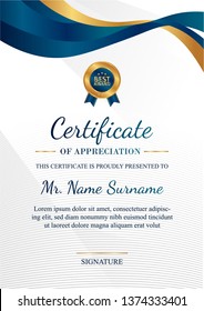 Certificate of appreciation template, gold and blue color. Clean modern certificate with gold badge. Vertical certificate border template with luxury and modern line pattern. Diploma vector template