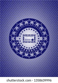 certificate icon inside badge with denim texture