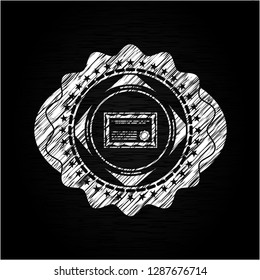 certificate icon inside chalkboard emblem written on a blackboard