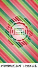 certificate icon inside christmas colors badge.