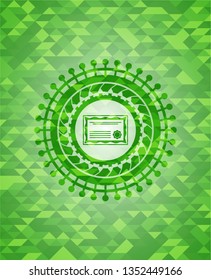 certificate icon inside green emblem with mosaic ecological style background