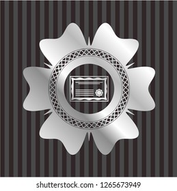 certificate icon inside silvery emblem or badge