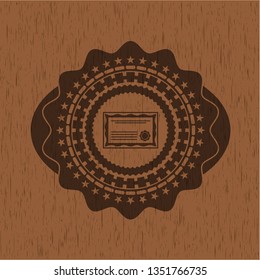 certificate icon inside vintage wood emblem