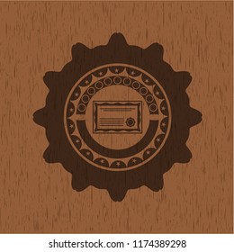 certificate icon inside wooden emblem. Vintage.