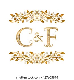 C&F vintage initials logo symbol. Letters C, F, ampersand surrounded floral ornament. Wedding or business partners initials monogram in royal style.