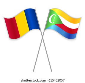 Chadian and Comoran crossed flags. Chad combined with Comoros isolated on white. Language learning, international business or travel concept.