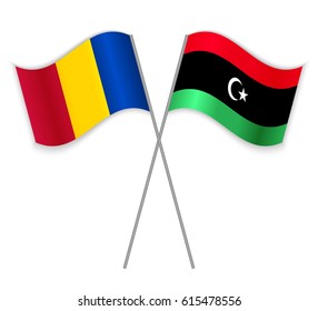 Chadian and Libyan crossed flags. Chad combined with Libya isolated on white. Language learning, international business or travel concept.