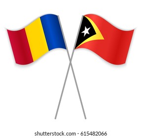 Chadian and Timorese crossed flags. Chad combined with East Timor isolated on white. Language learning, international business or travel concept.