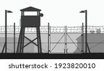 chain fence and guard tower at military base