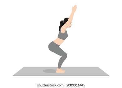 Chair Pose, Fierce Pose, Beautiful girl practice Utkatasana. Young attractive woman practicing yoga exercise. working out, black wearing sportswear, grey pants and top, indoor full length, calmness.