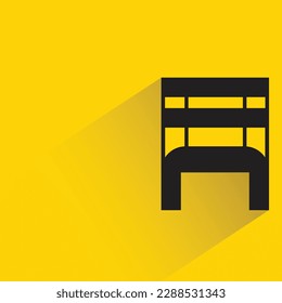 chair with shadow on yellow background