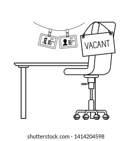 chair with vacant poster hanging in the office