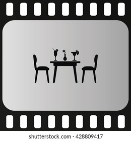 Chairs and table icon. Restaurant interior. 