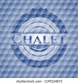 Chalet blue emblem with geometric pattern background.