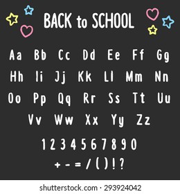Chalk board doodles: hand drawn English alphabet, numbers, punctuation, along with the words "Back to school" and cute little drawings.