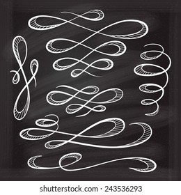 Chalk decorative curls and swirls design elements on the blackboard