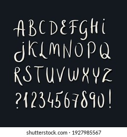Chalk drawing font. Handwritten letters and numbers isolated on black background. Vector typefont set.