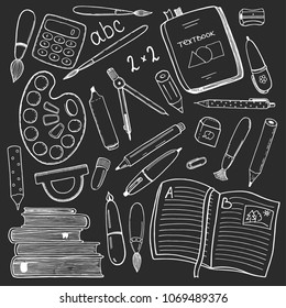 Chalk drawing school stationary elements on blackboard background. Palette, pens, pencils, eraser, sharpener, compasses, textbooks, etc. Retro style sketch. For graduation, back to school design.