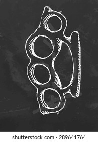 Chalk drawn brass knuckles. Vector illustration.