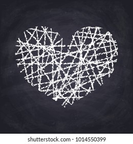 Chalk drawn heart on chalkboard background.