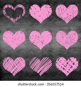Chalk drawn vector collection of hearts. Set of hearts in pink and red color on chalk board or school board. 