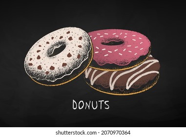 Chalk drawn vector illustration of Donuts. Isolated on black chalkboard background.