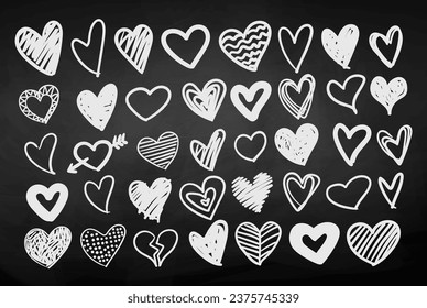 Chalk drawn vector isolated hand drawn heart doodles on chalkboard background