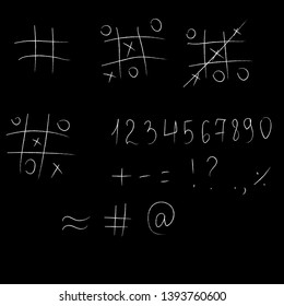 chalk figures and noughts and crosses on a graphite board
