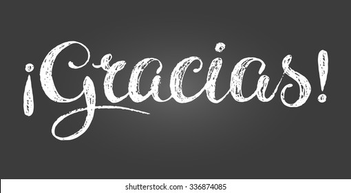 Chalk lettering inscription in Spanish. Means thank you. White letters on gray gradient background. Hand drawn composition. Straight and inverted exclamation mark. Decoration for store or cafe. 